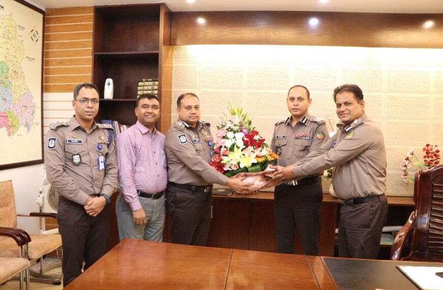 GMP Commissioner Israel Howlader congratulates Additional Police Commissioner Zahidul Hasan on his promotion to the post of DIG