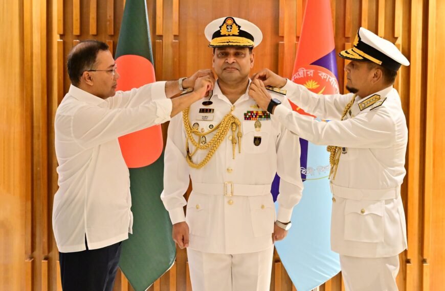 Newly appointed Navy Chief Khondaker Misbah ul Azim wears Vice Admiral rank badge from Prime Minister