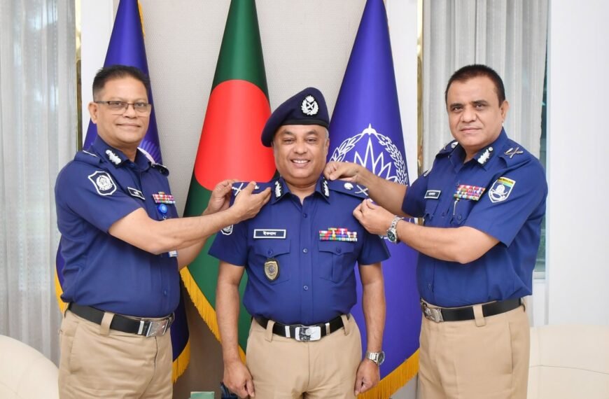 IGP puts rank badge on promoted Additional IG Md. Iqbal Hossain